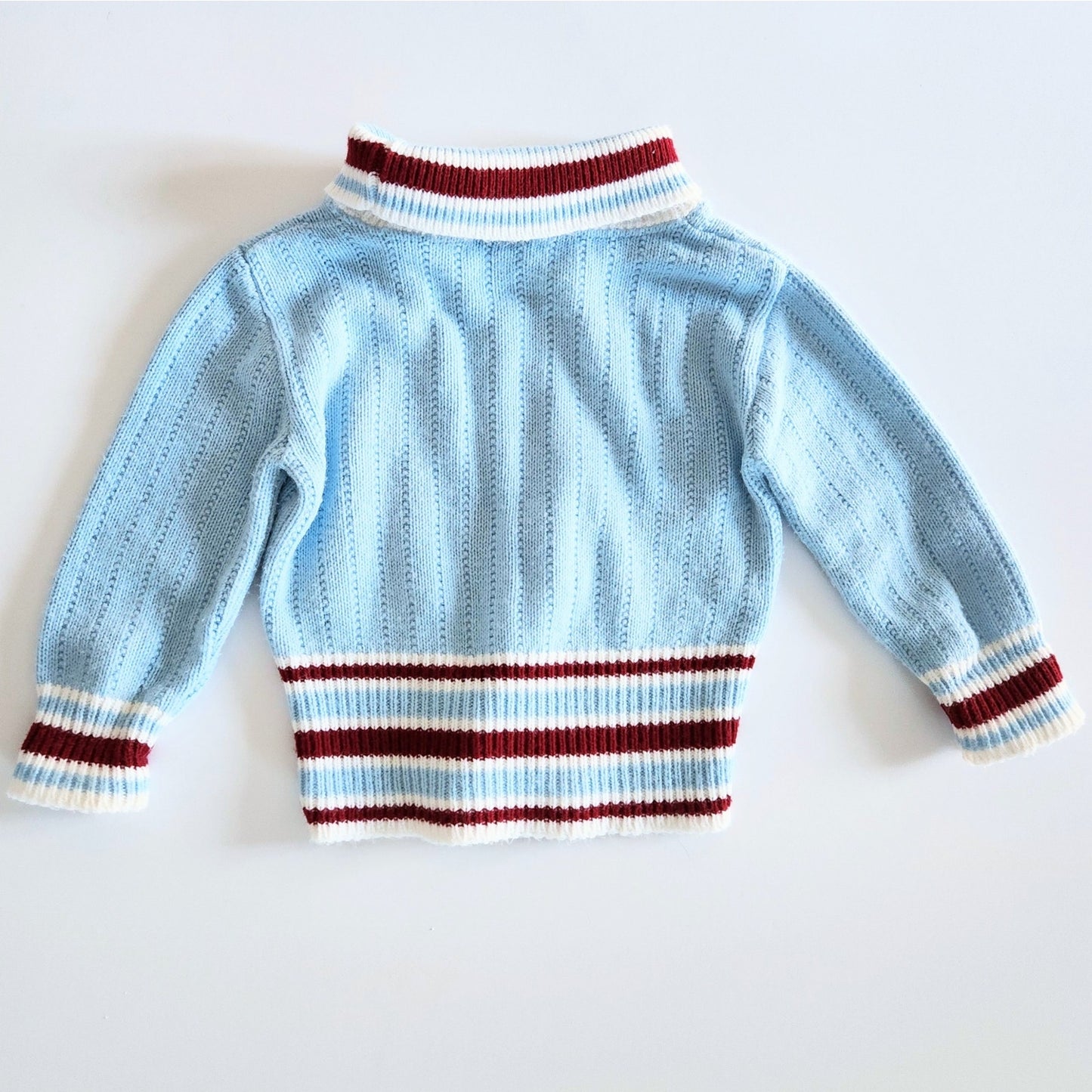 Vintage 1960s Doe Spun Toddler Turtleneck Sweater – Baby Blue with Penny Farthing Embroidery – Size 2T