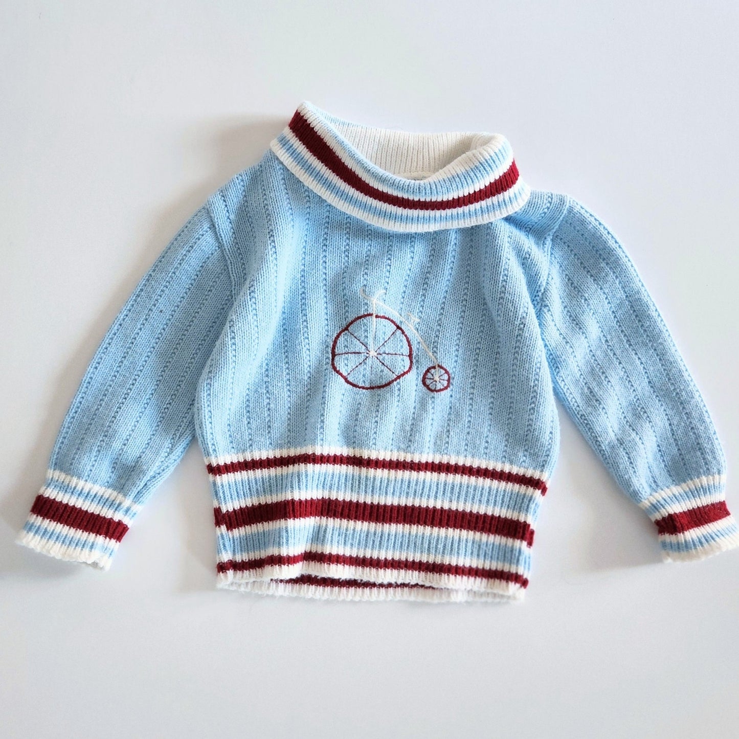 Vintage 1960s Doe Spun Toddler Turtleneck Sweater – Baby Blue with Penny Farthing Embroidery – Size 2T